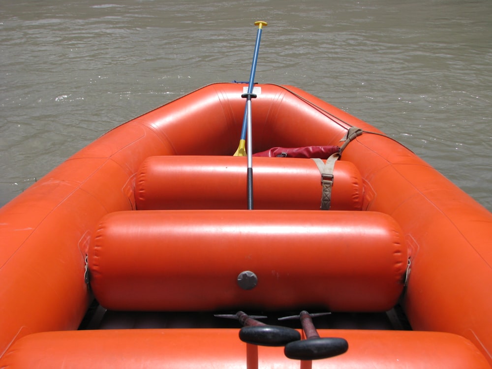 a red boat on water