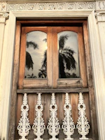 Elegant aluminium window frames installed on a luxury villa reflecting the desert sky.
