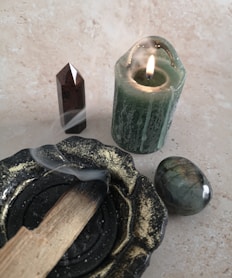 a candle and a lighter