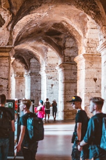 A group of participants walking through the historic Stovia building during the tour.