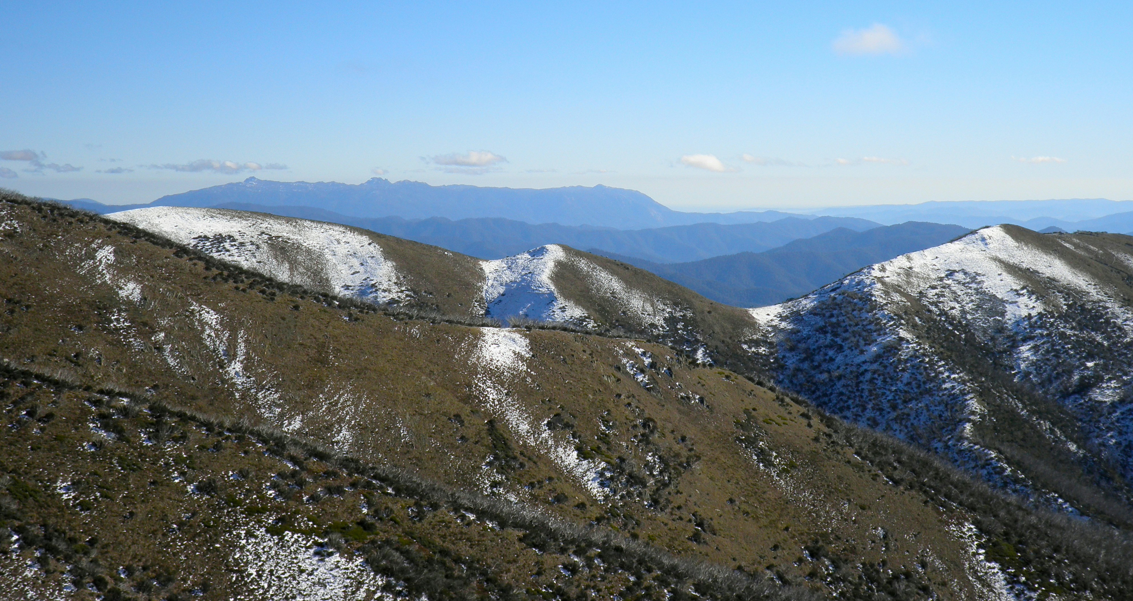a mountain range with snow