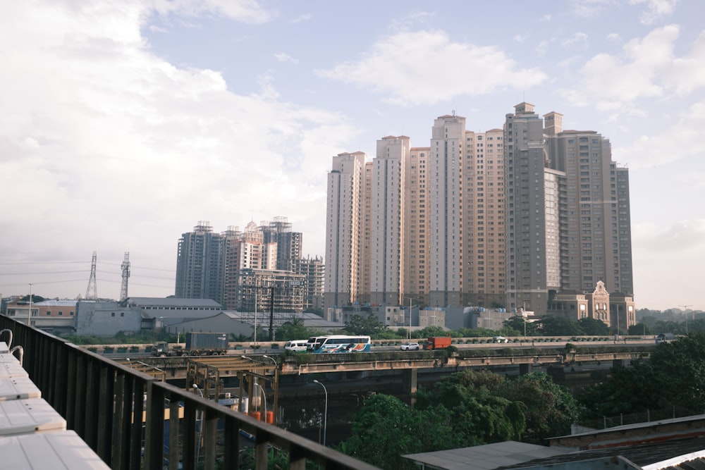 a city skyline with a bridge