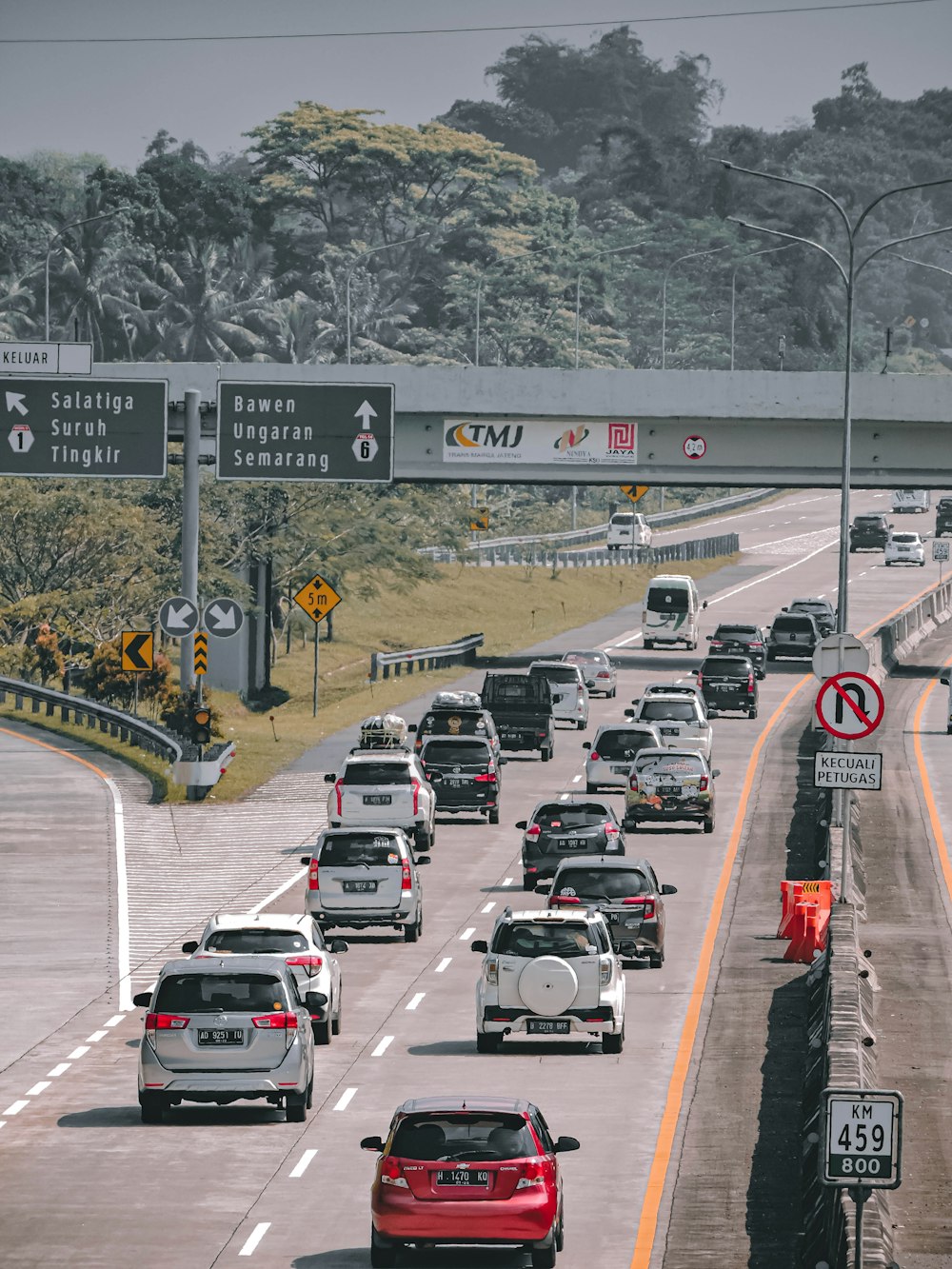 a highway with many cars