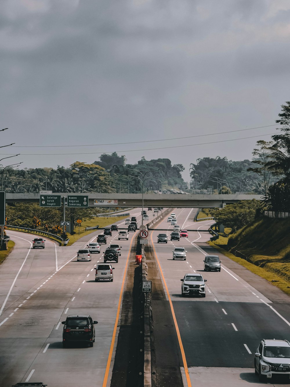 a highway with many cars