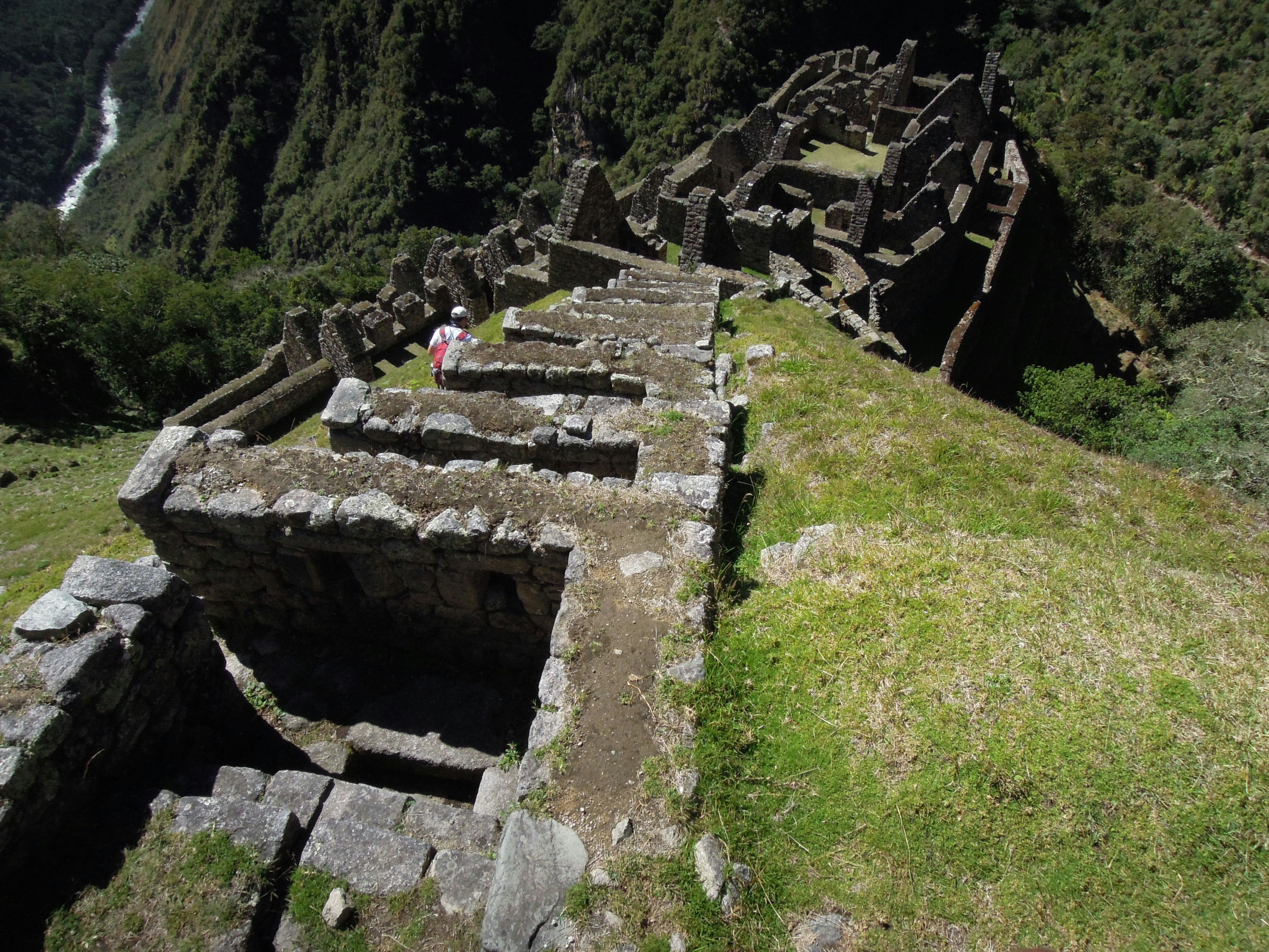 people walking on a stone bridge, 