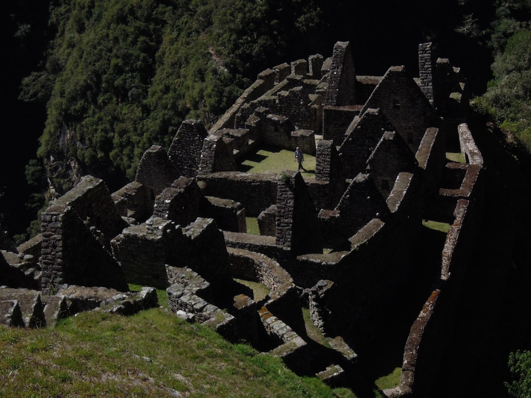 a stone building with a large staircase,