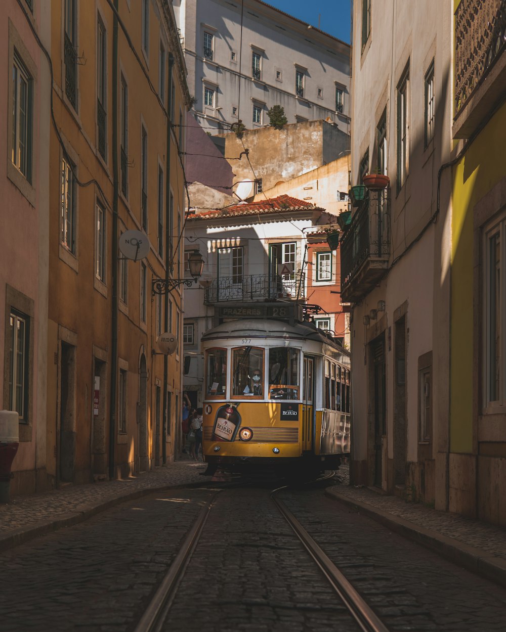 a trolley going through a city