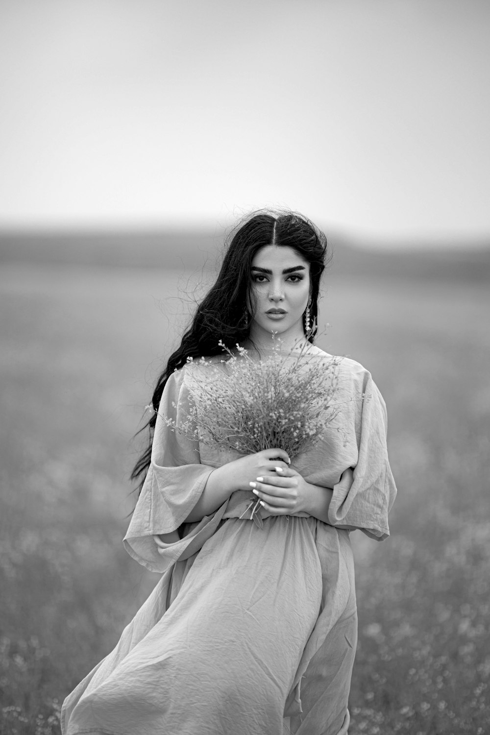 Clara Lago standing in a field