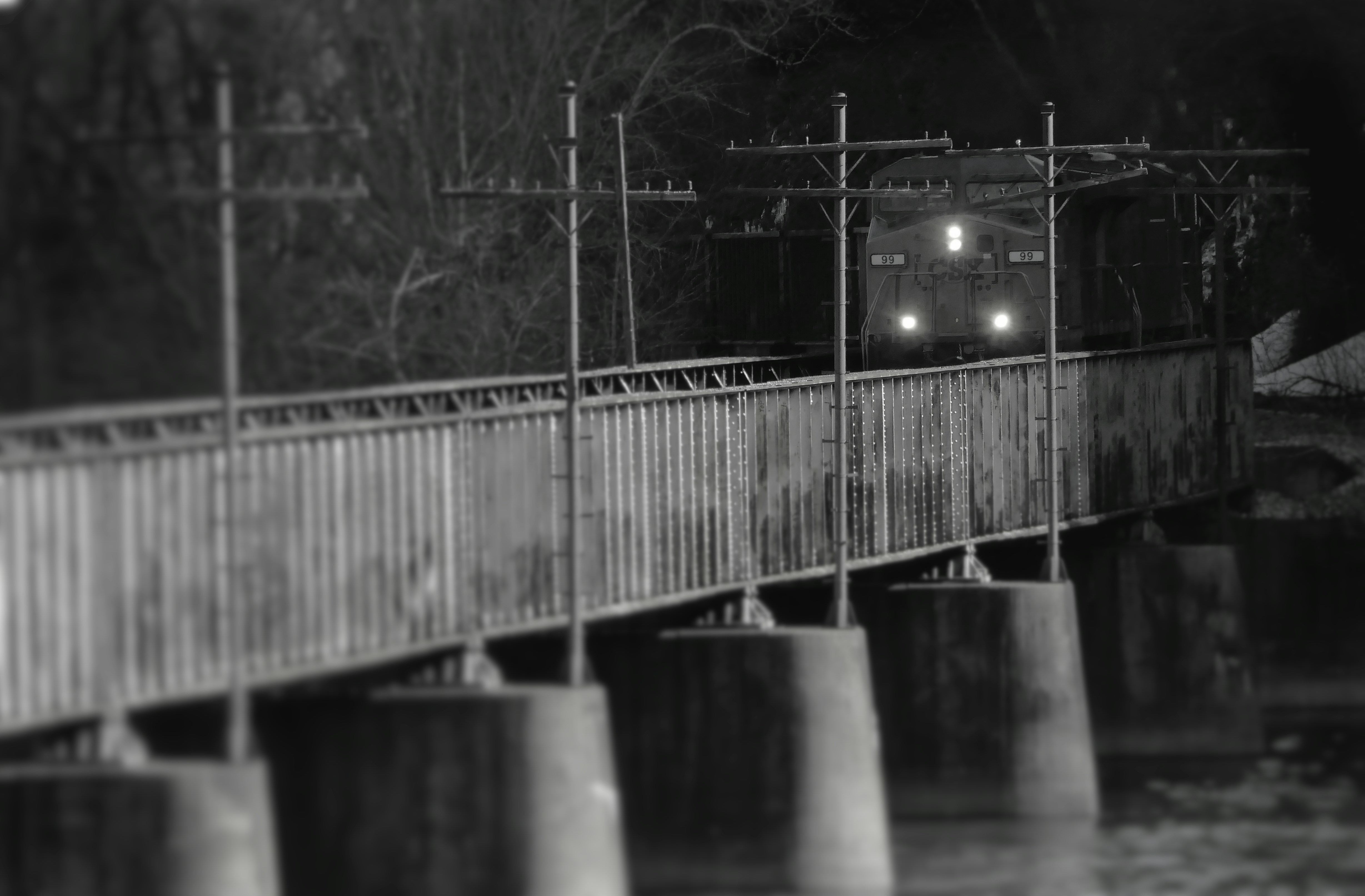 train emerging from dark
