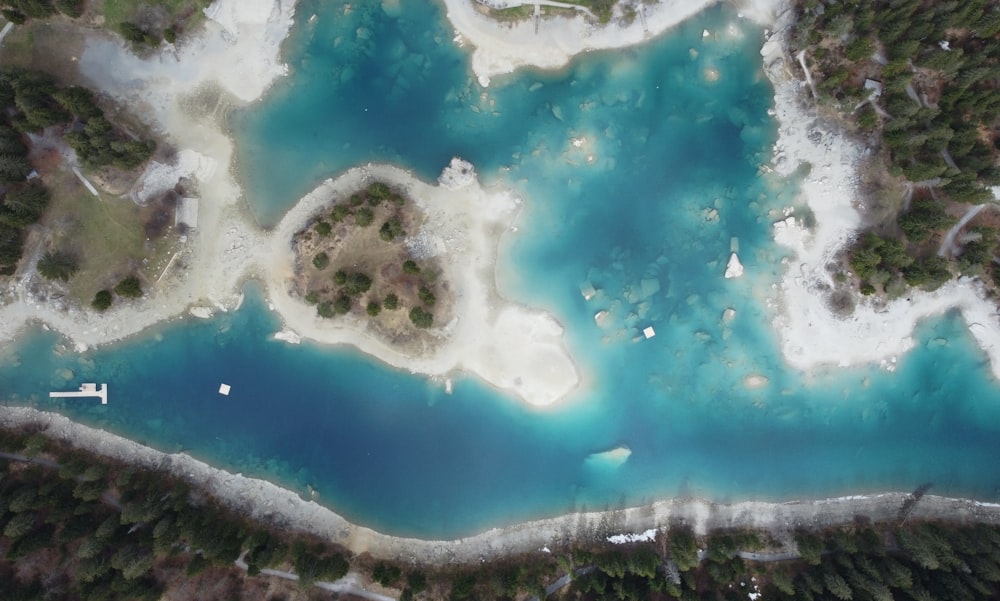 a body of water with a land in the background