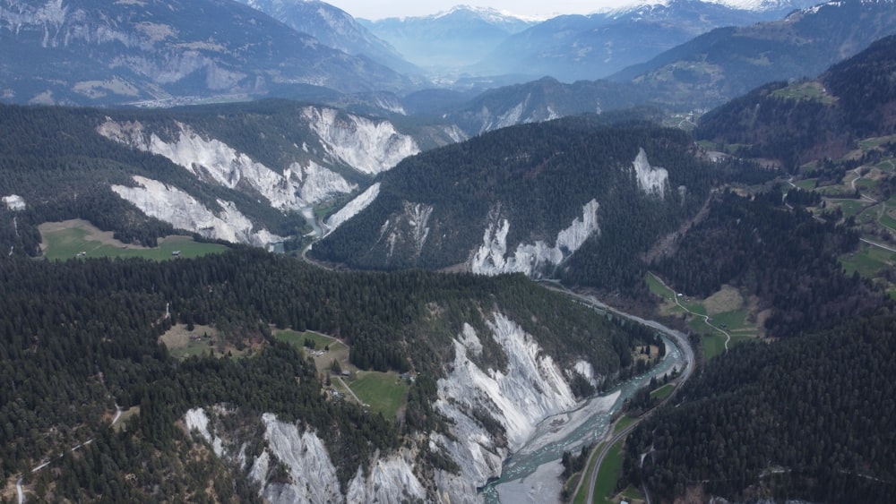 a winding road through a valley