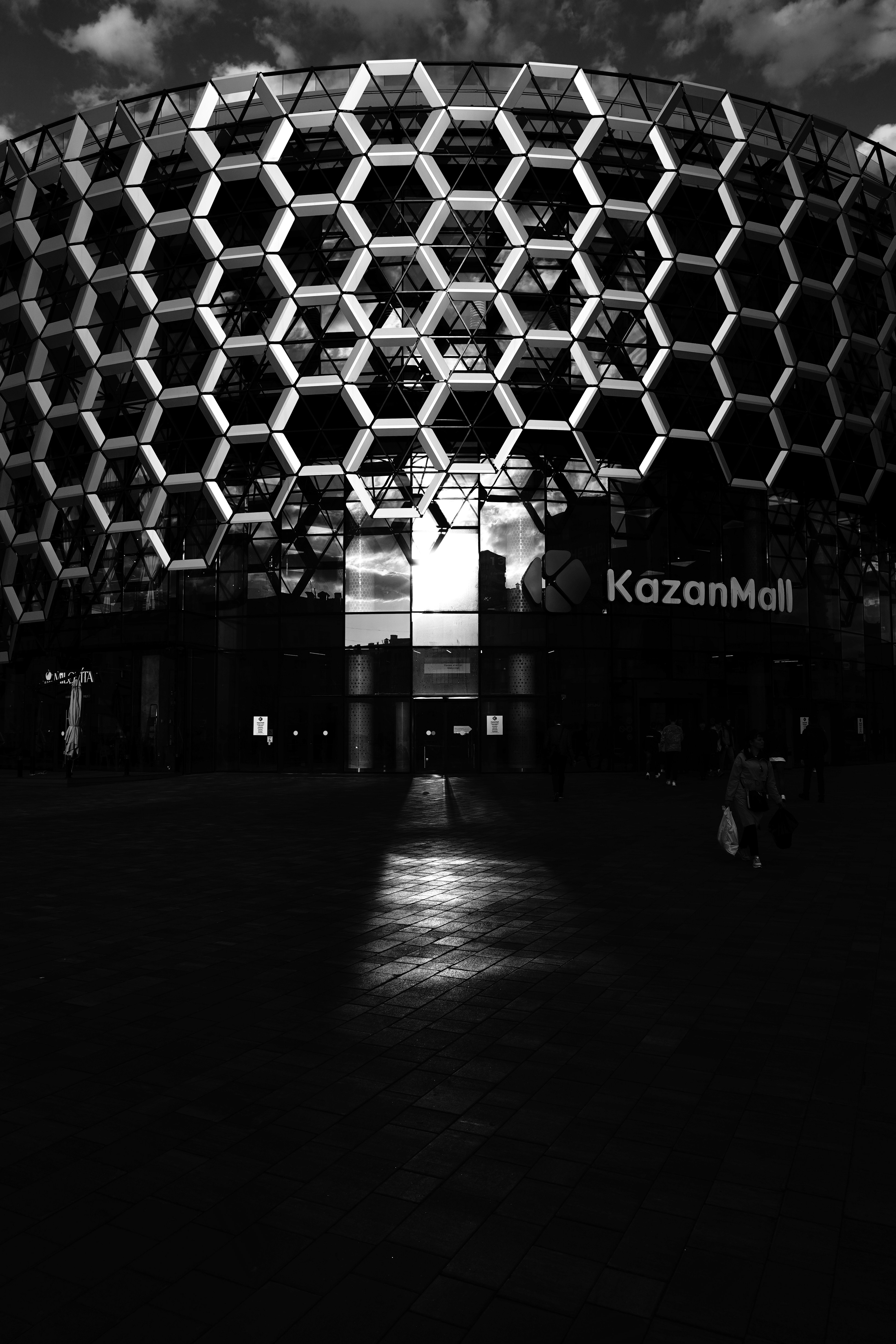 a building with a large glass wall