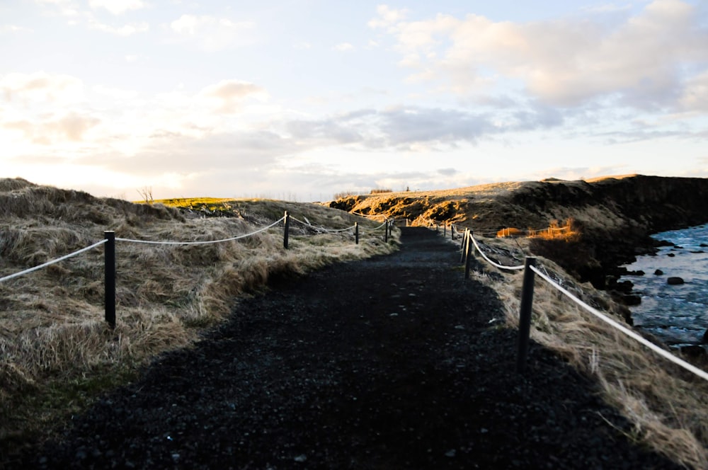 a fence on a hill