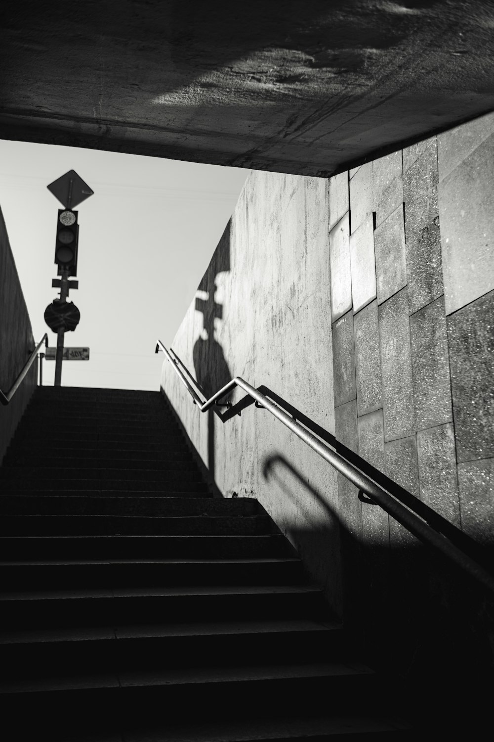 a staircase leading up to a lamp post