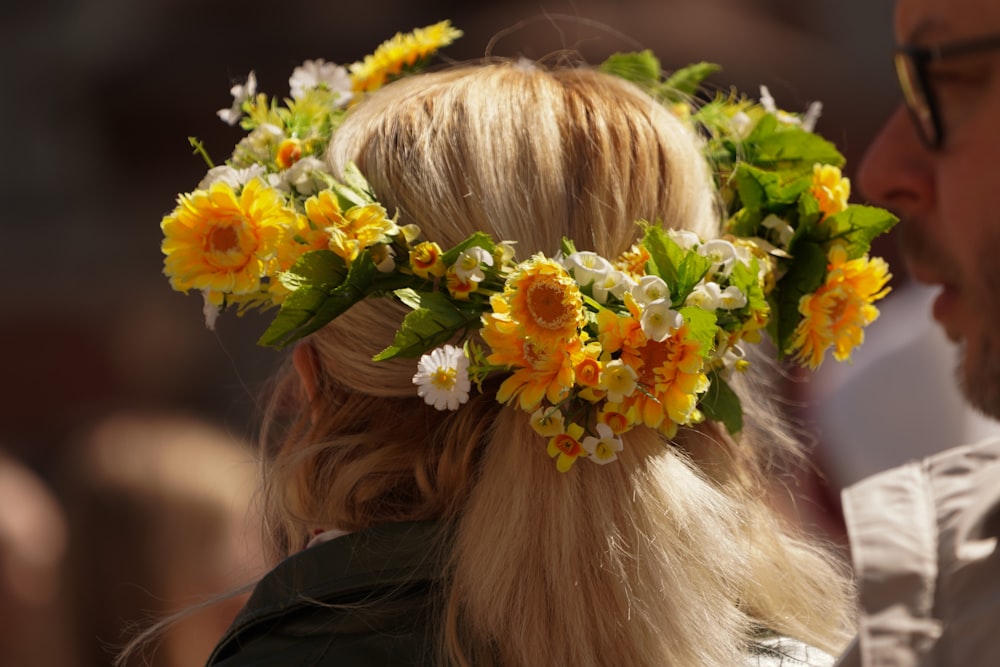 a woman with flowers in her hair