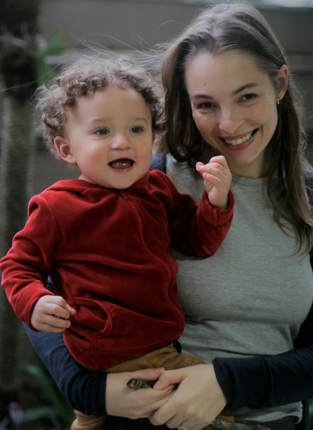 a person holding a baby