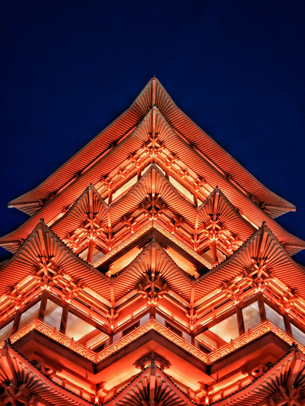 a tall building with a red roof