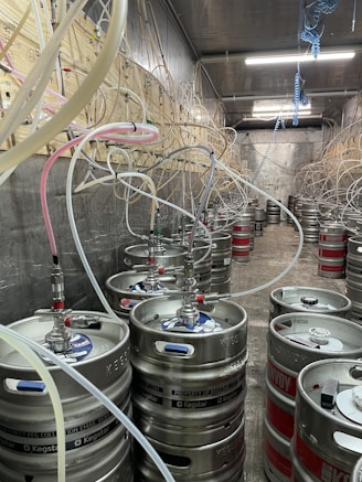 a large room with many metal pipes