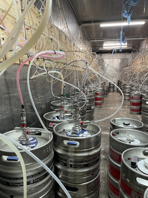 a large room with many metal pipes