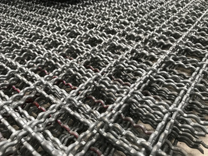 Close-up of 316 stainless steel woven wire mesh showing fine, corrosion-resistant strands.