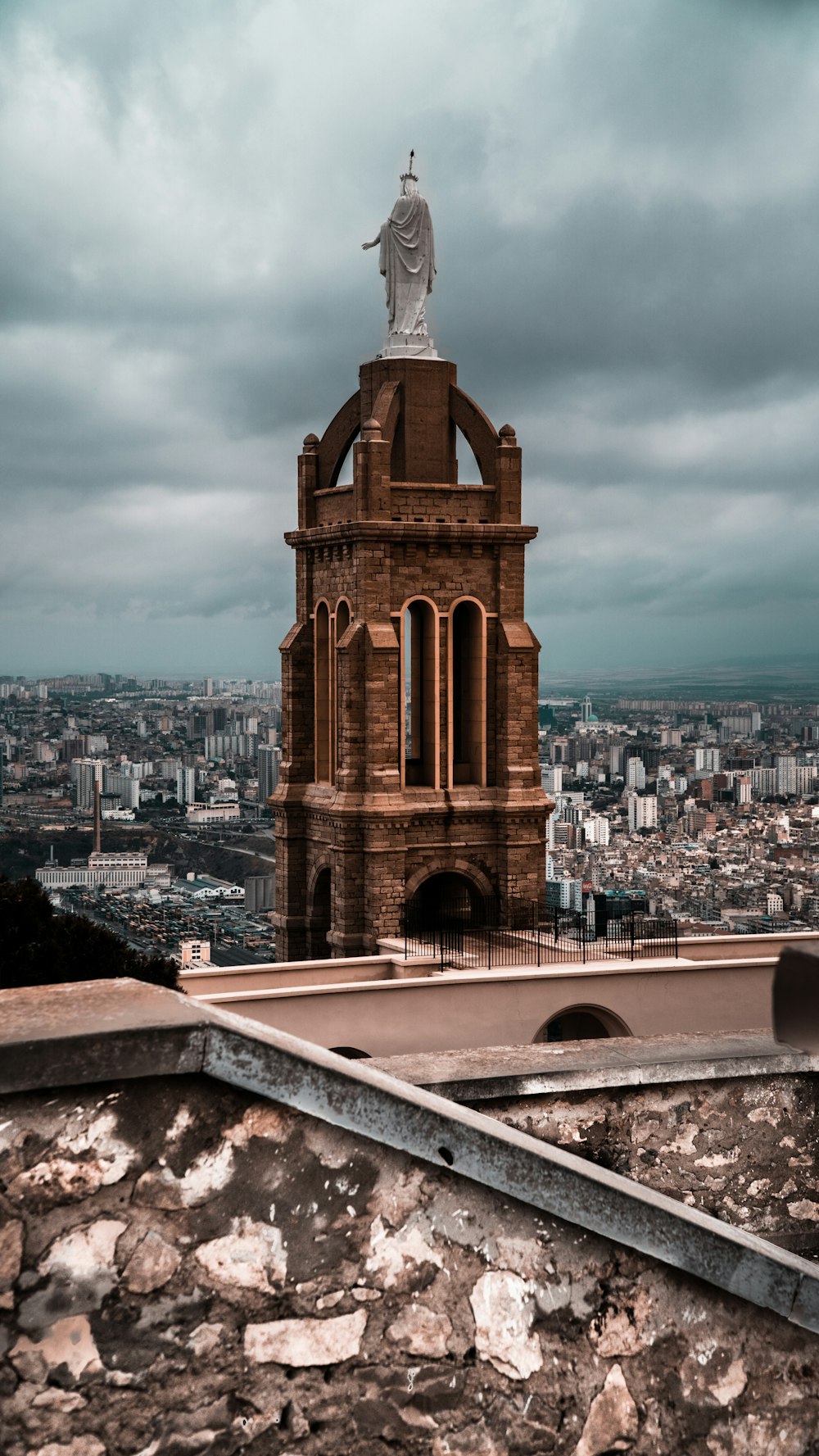 a statue on a tower