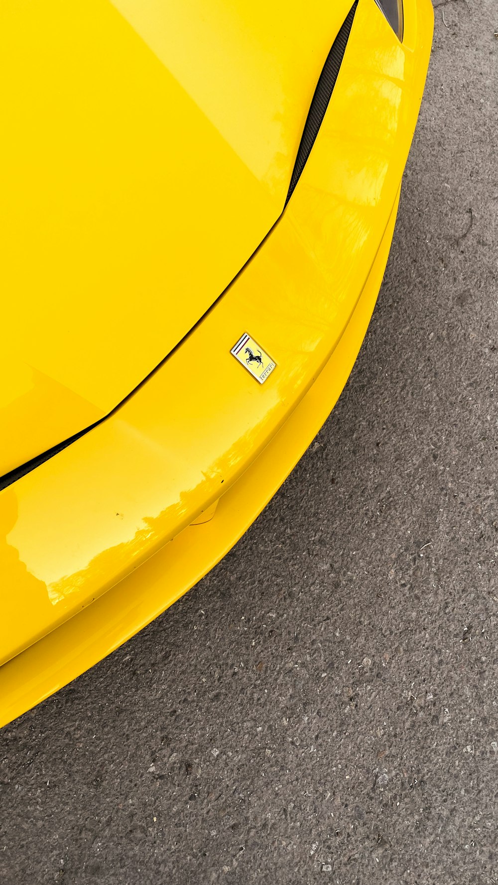 a yellow car with a white box on the side