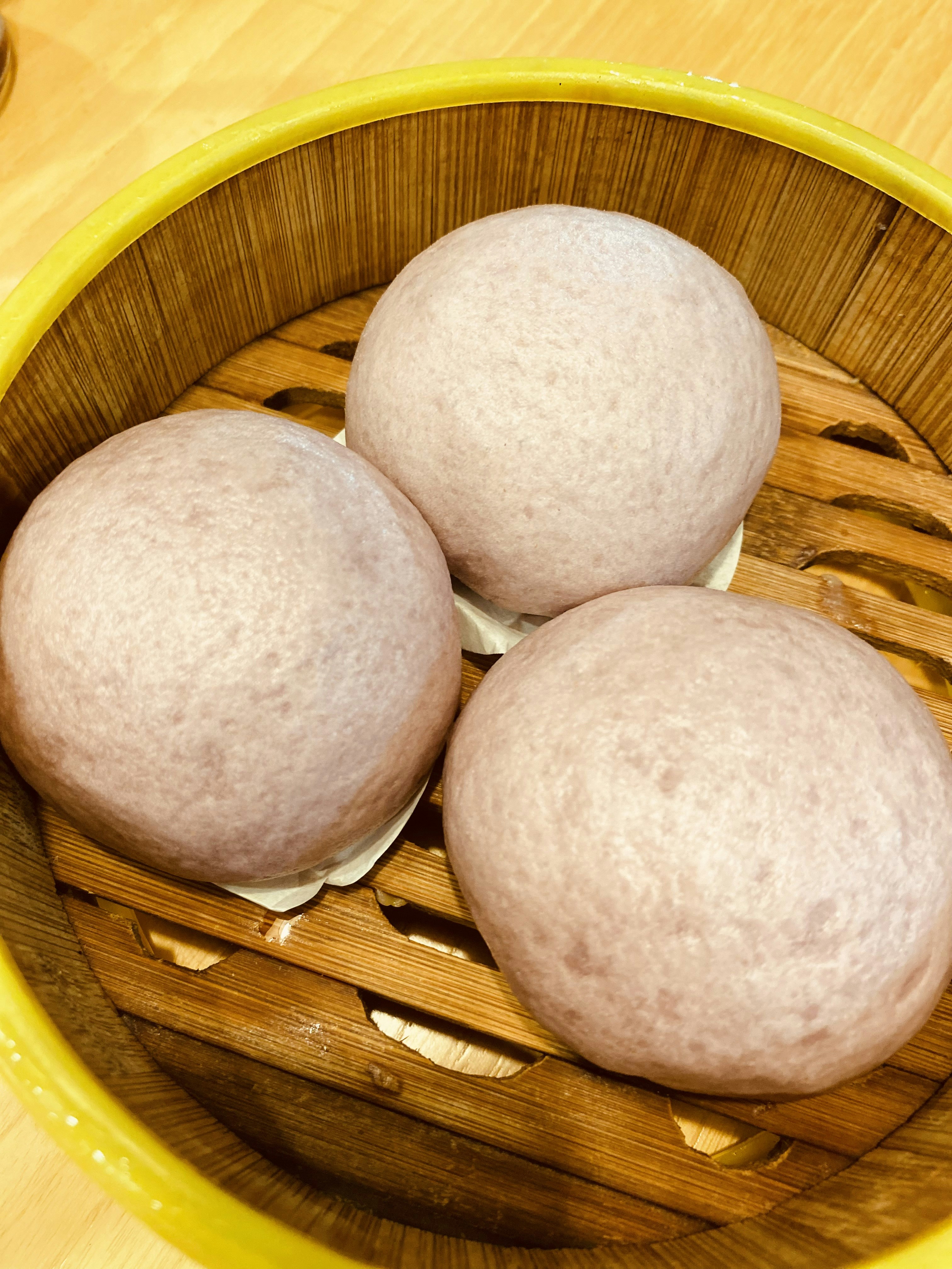 a group of round objects on a wooden surface
