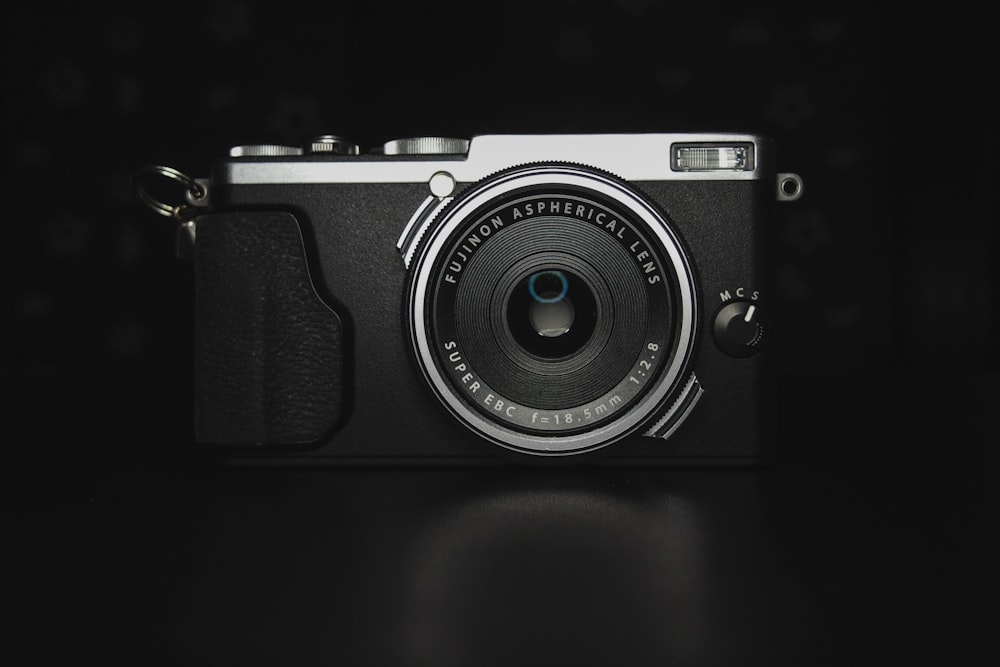 a black and white photo of a camera