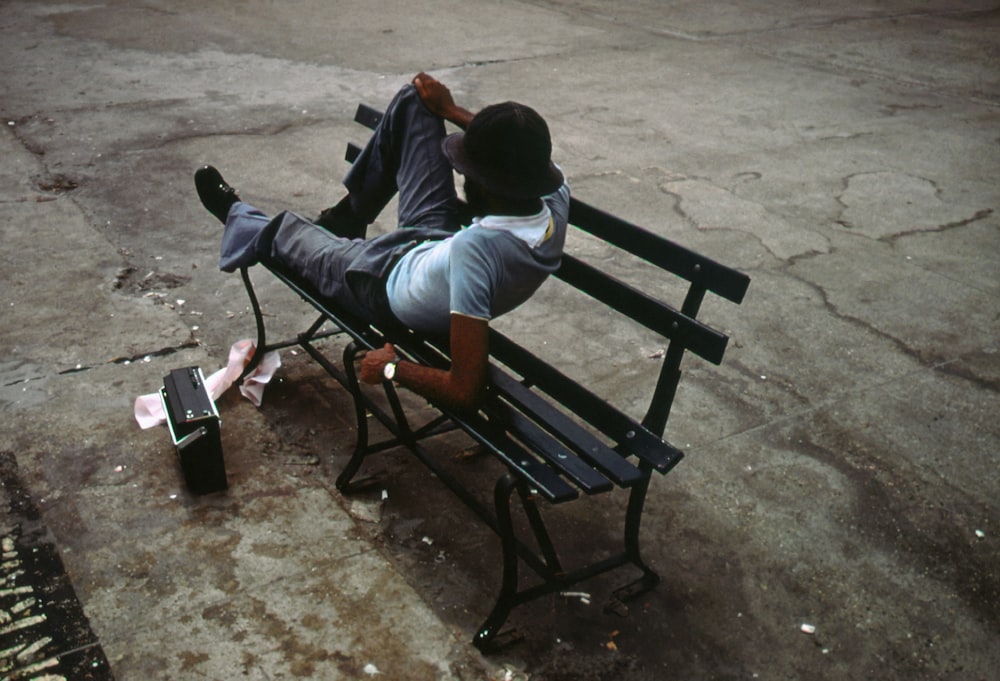 a person sitting on a bench