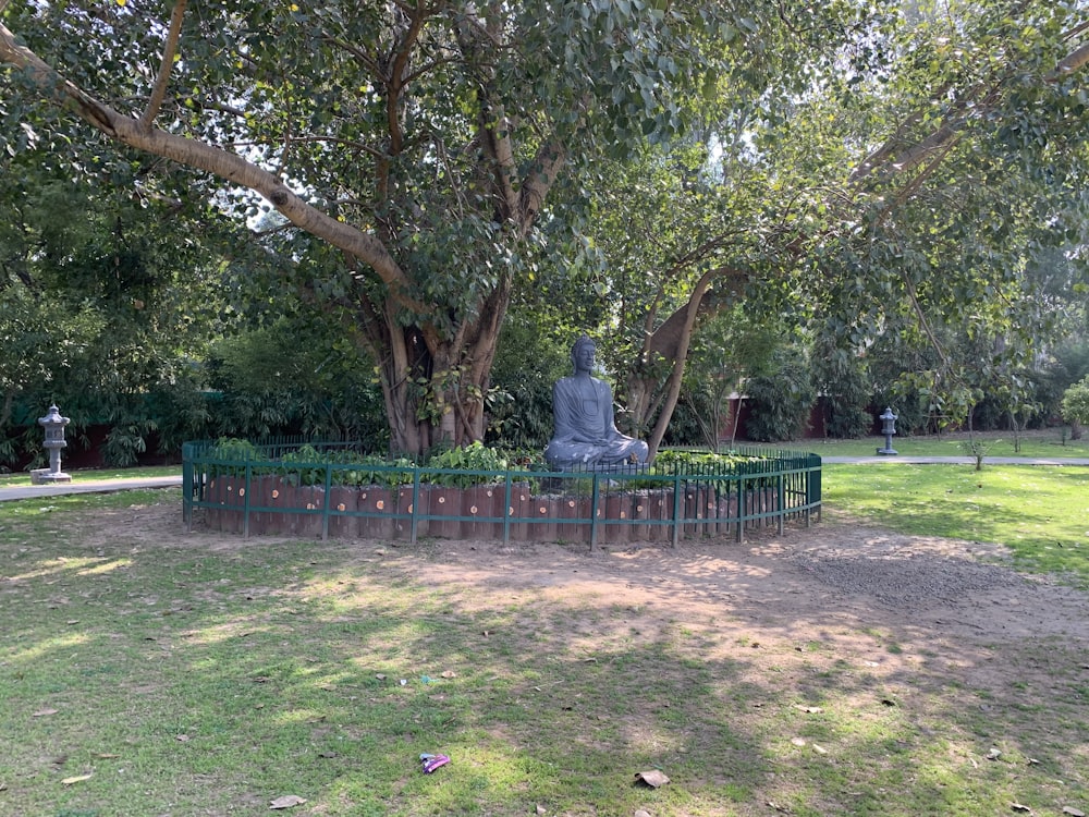 a statue in a park