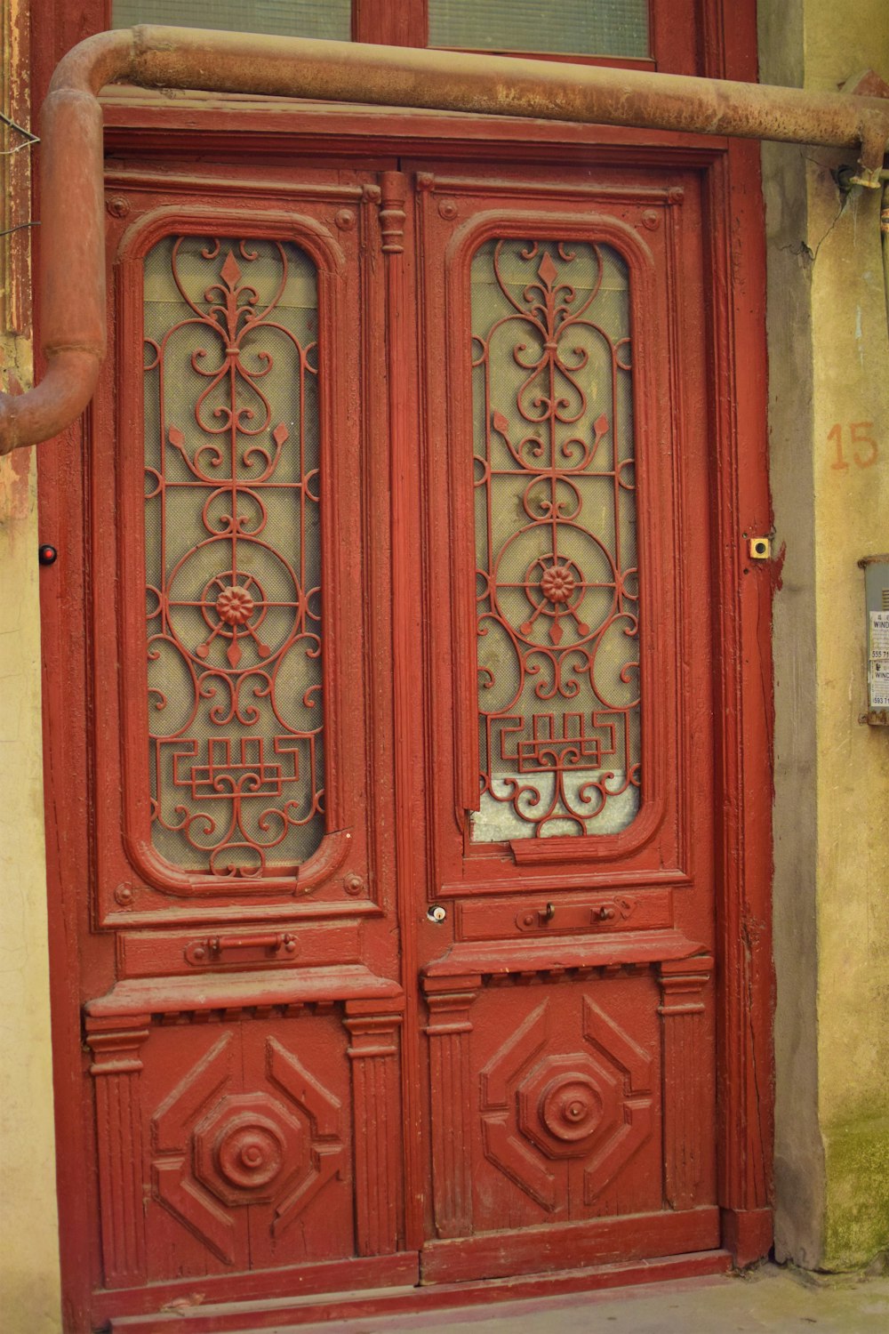 a red door with a gold handle