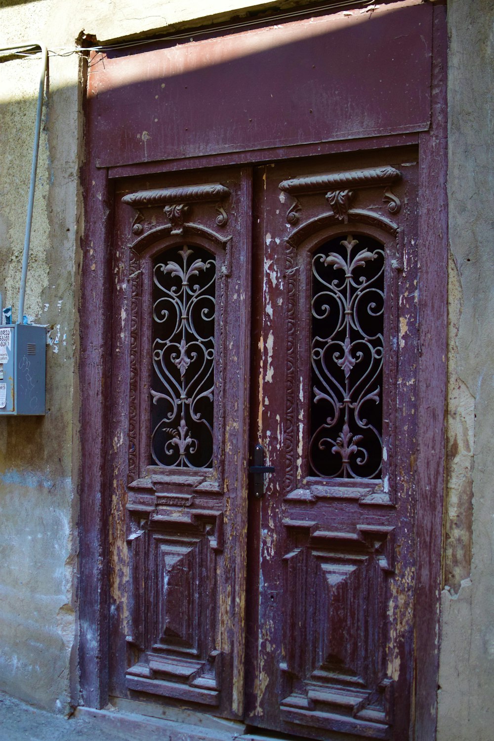 a wooden door with a metal frame