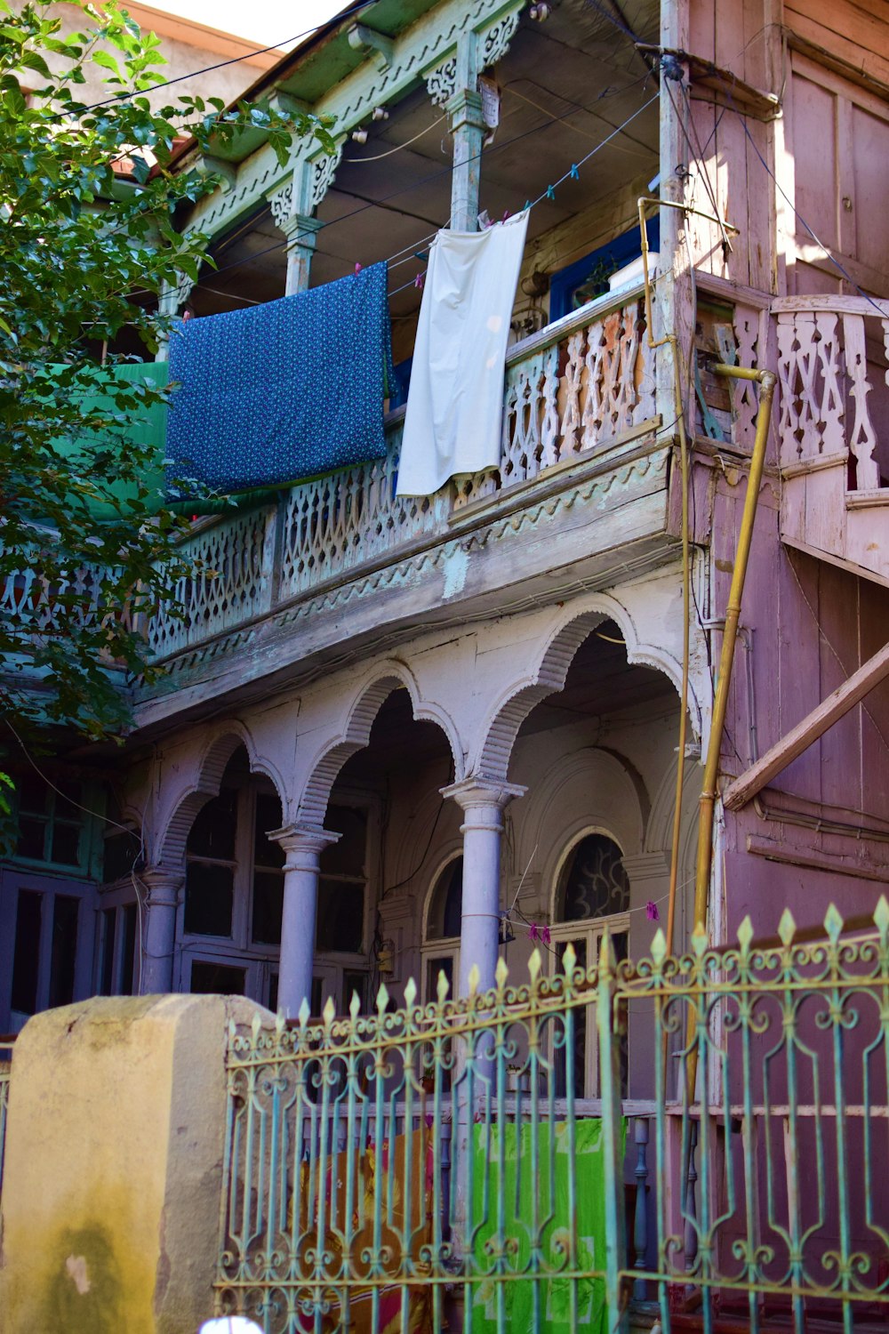 a building with a fence and a gate