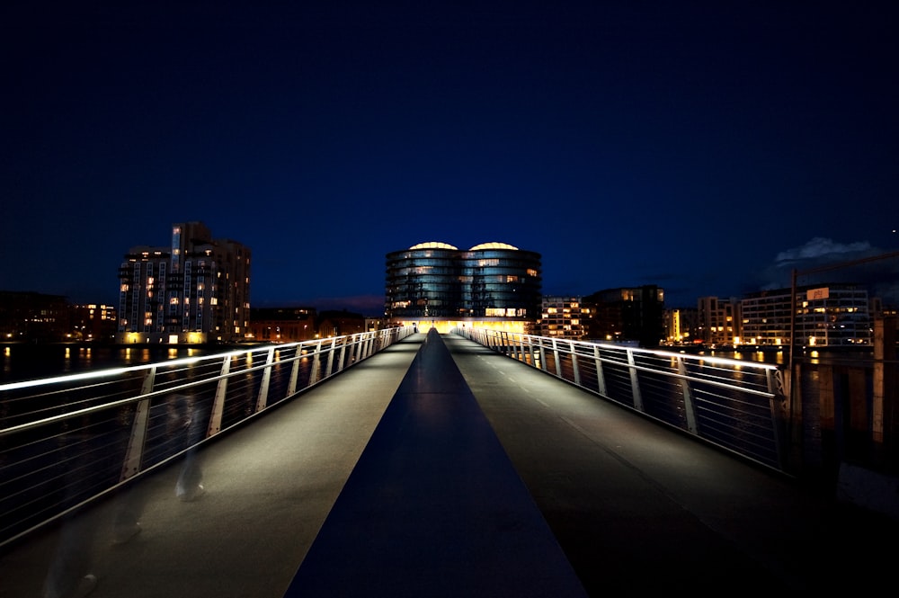 a bridge with lights on at night