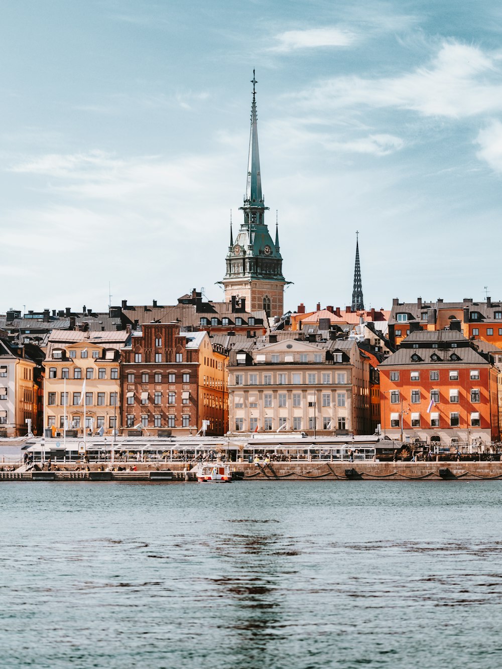 a body of water with buildings around it