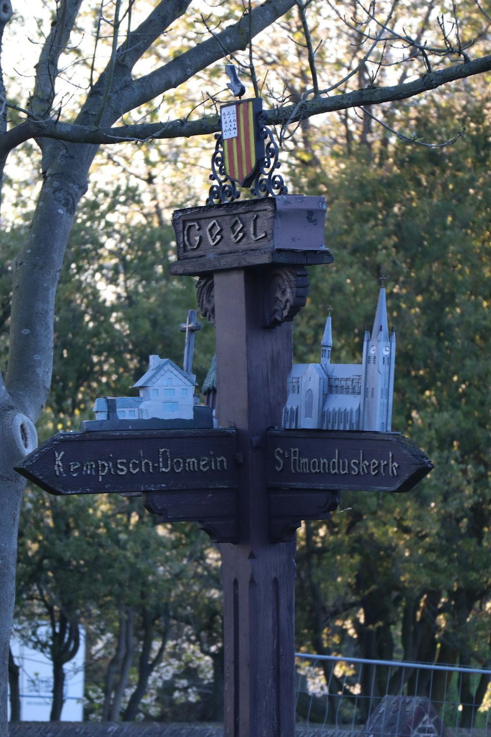 a street sign with flags