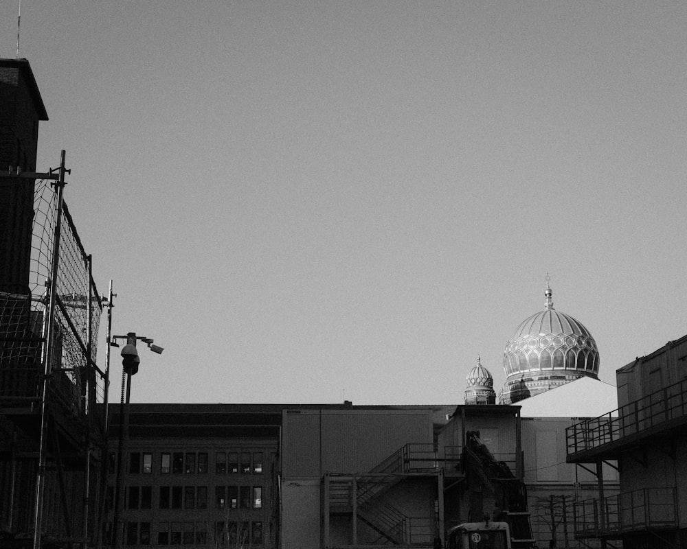 a group of buildings with a domed roof