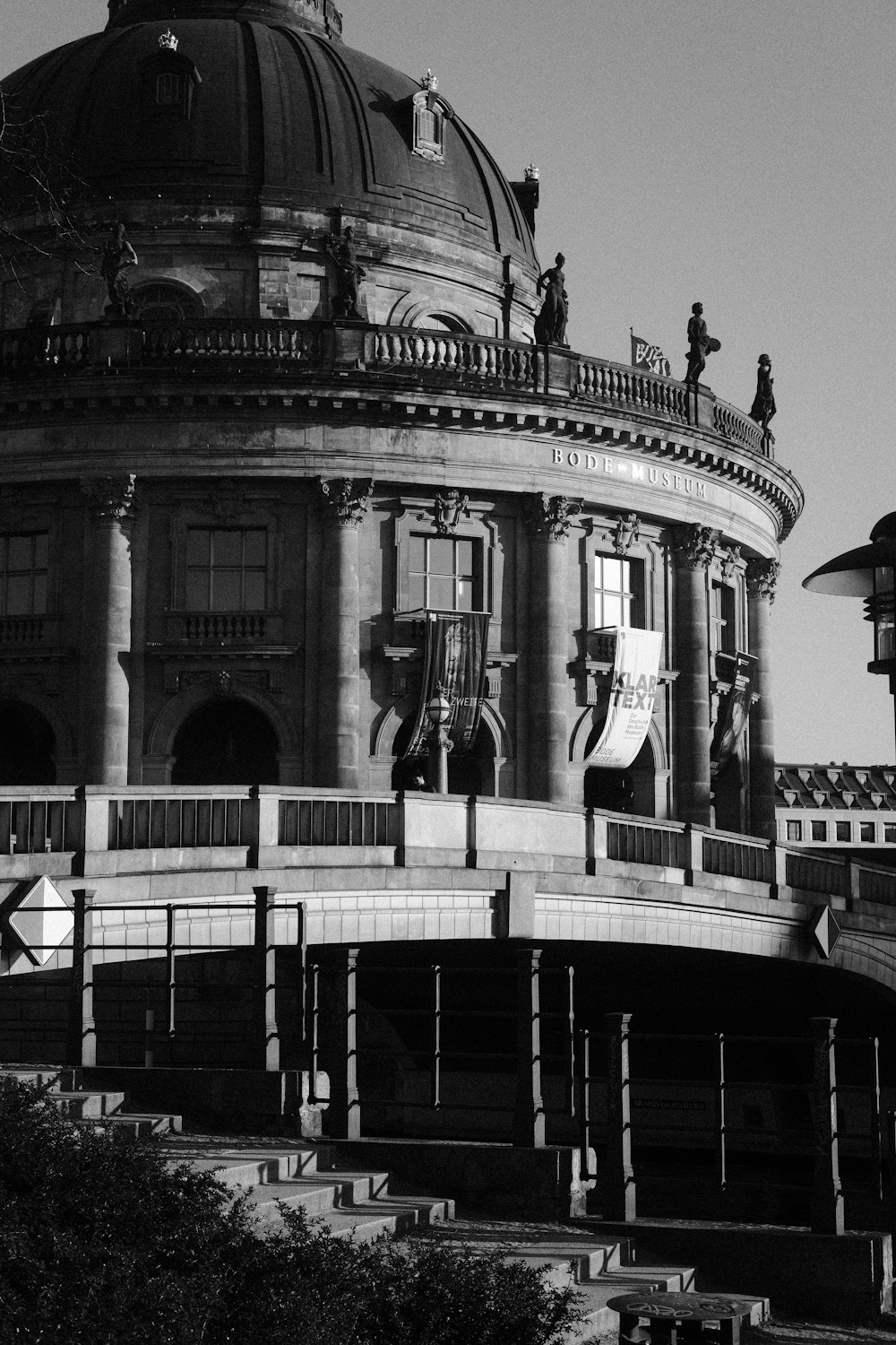 a building with a dome and statues