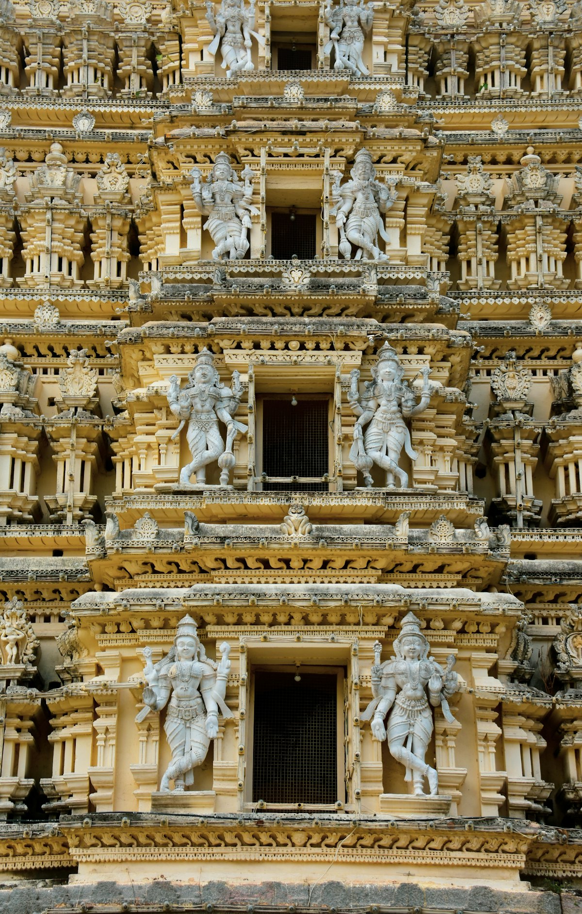 Khajuraho temple exterior with stone carvings