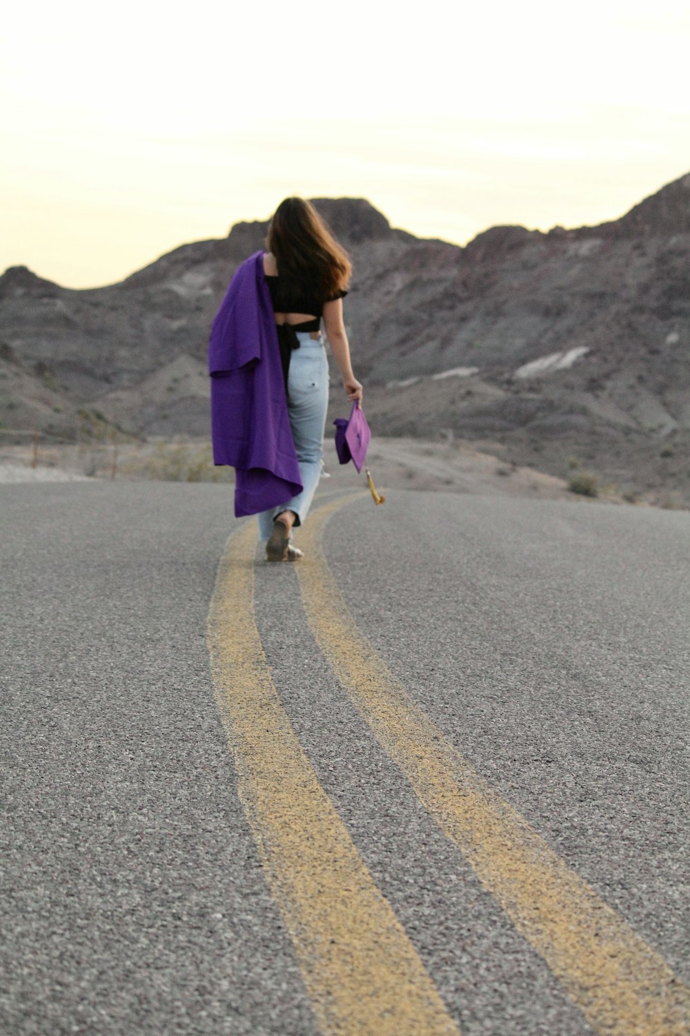 a person walking down a road