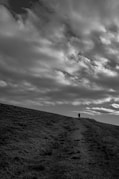 a person walking on a hill