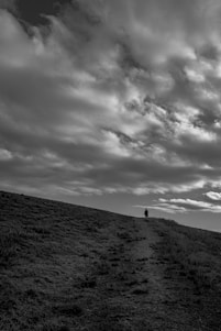 a person walking on a hill