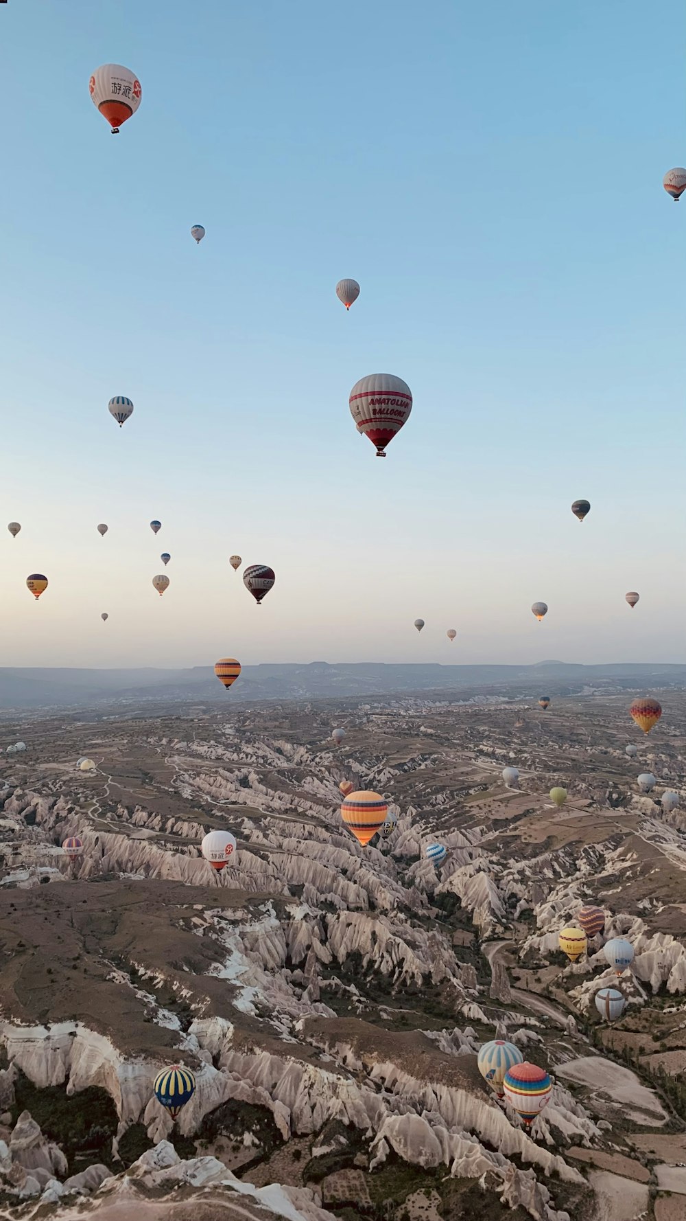 a group of hot air balloons in the sky