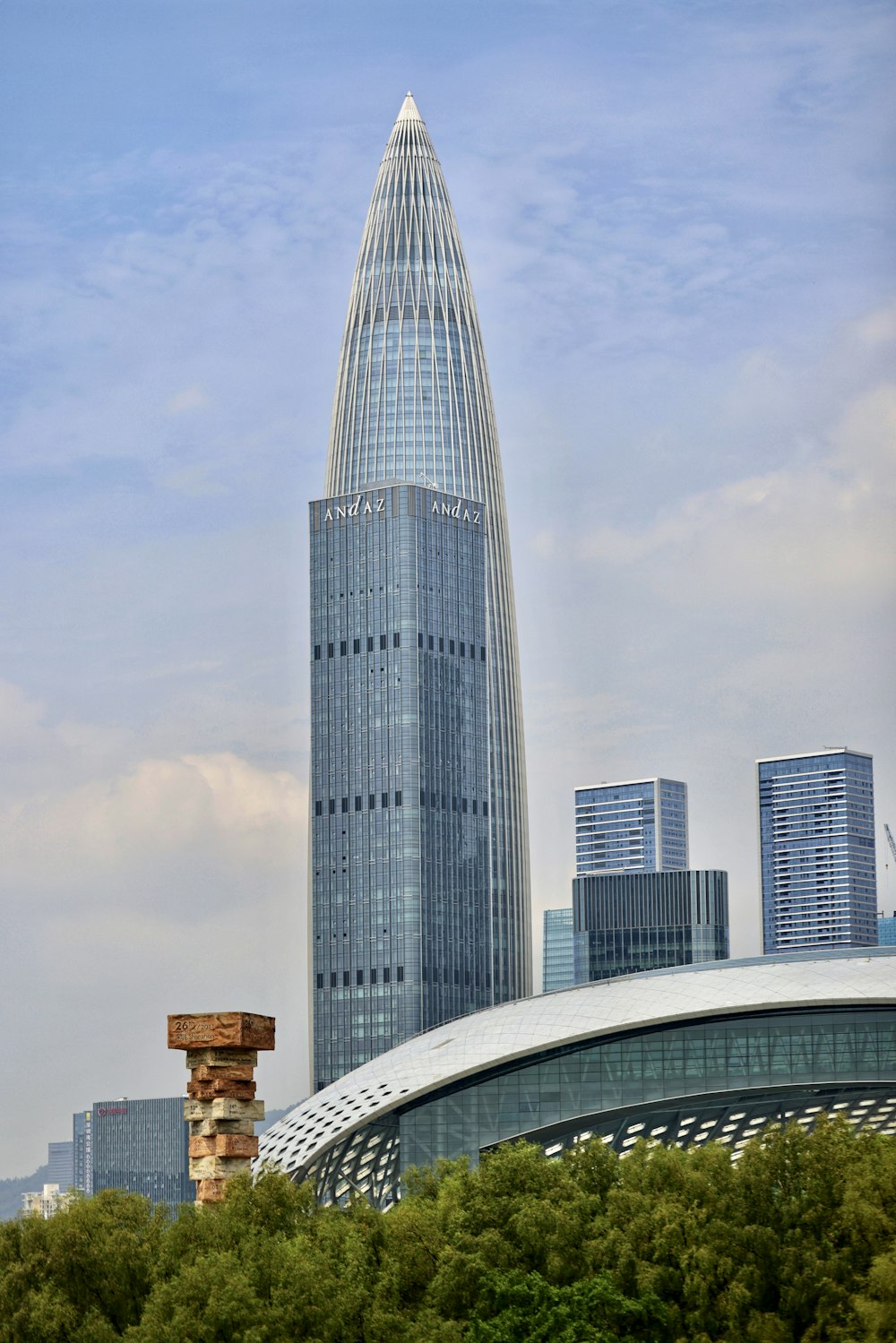 a tall building with glass walls