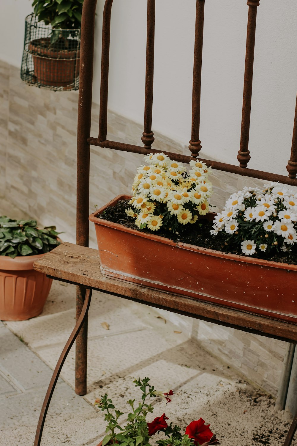 a bench with flowers