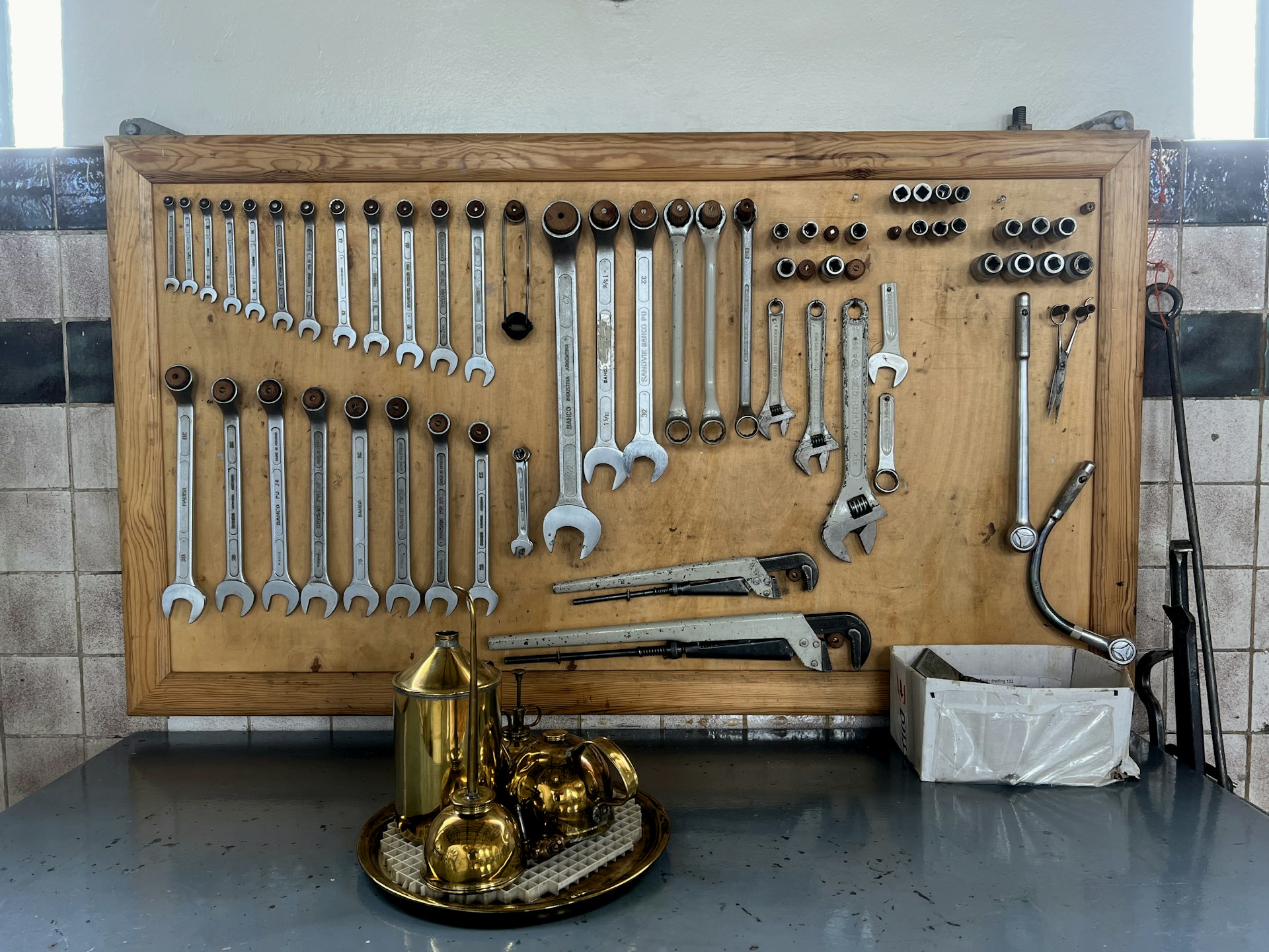 a large wooden box with pipes