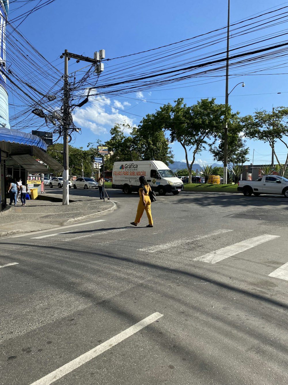 a person walking across a street