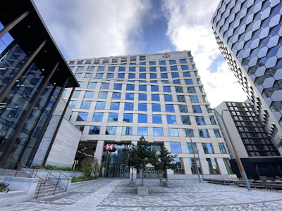 Modern high-rise building representing business loan opportunities.
