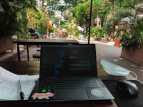 a laptop sits on a table