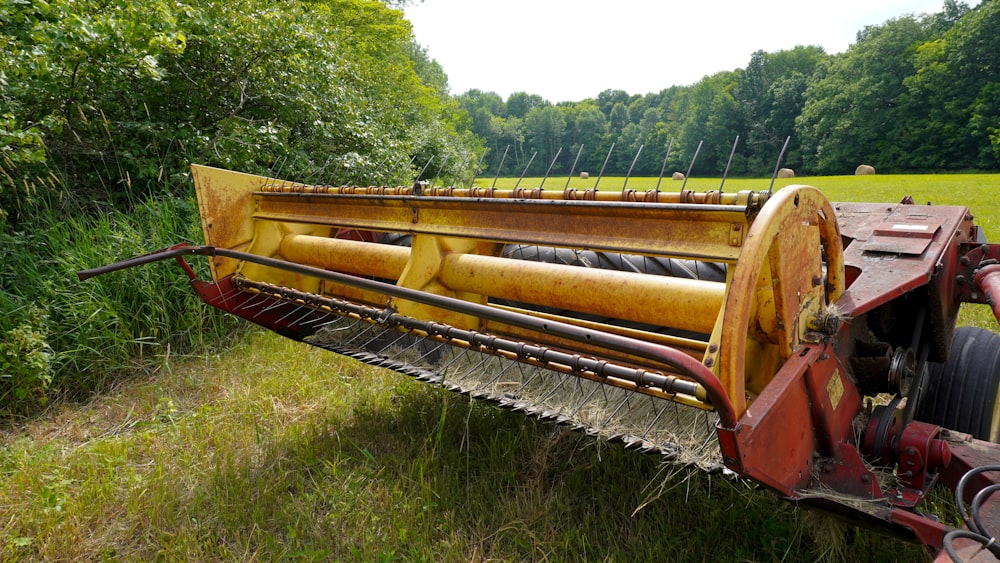 a rusty old tractor in a field